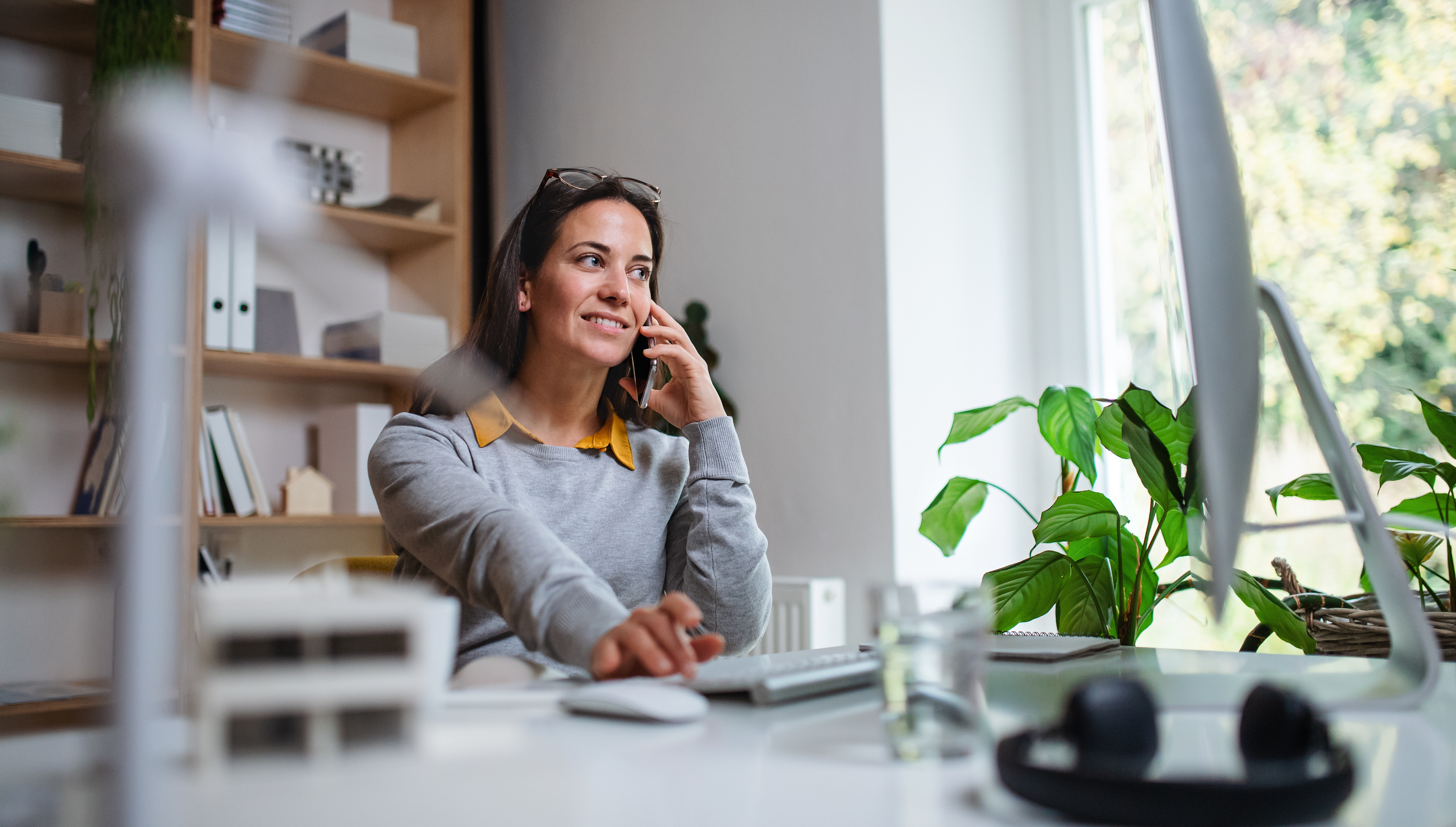 Ooma working at desk