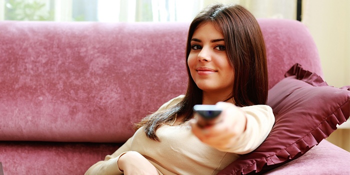 Woman with TV Remote