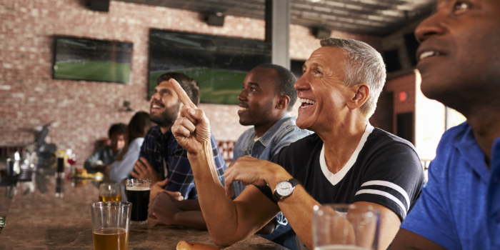 Watching TV at a Sports Bar